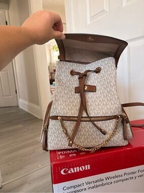 Michael Kors Cream MK Monogram Drawstring Backpack with Brown Trim